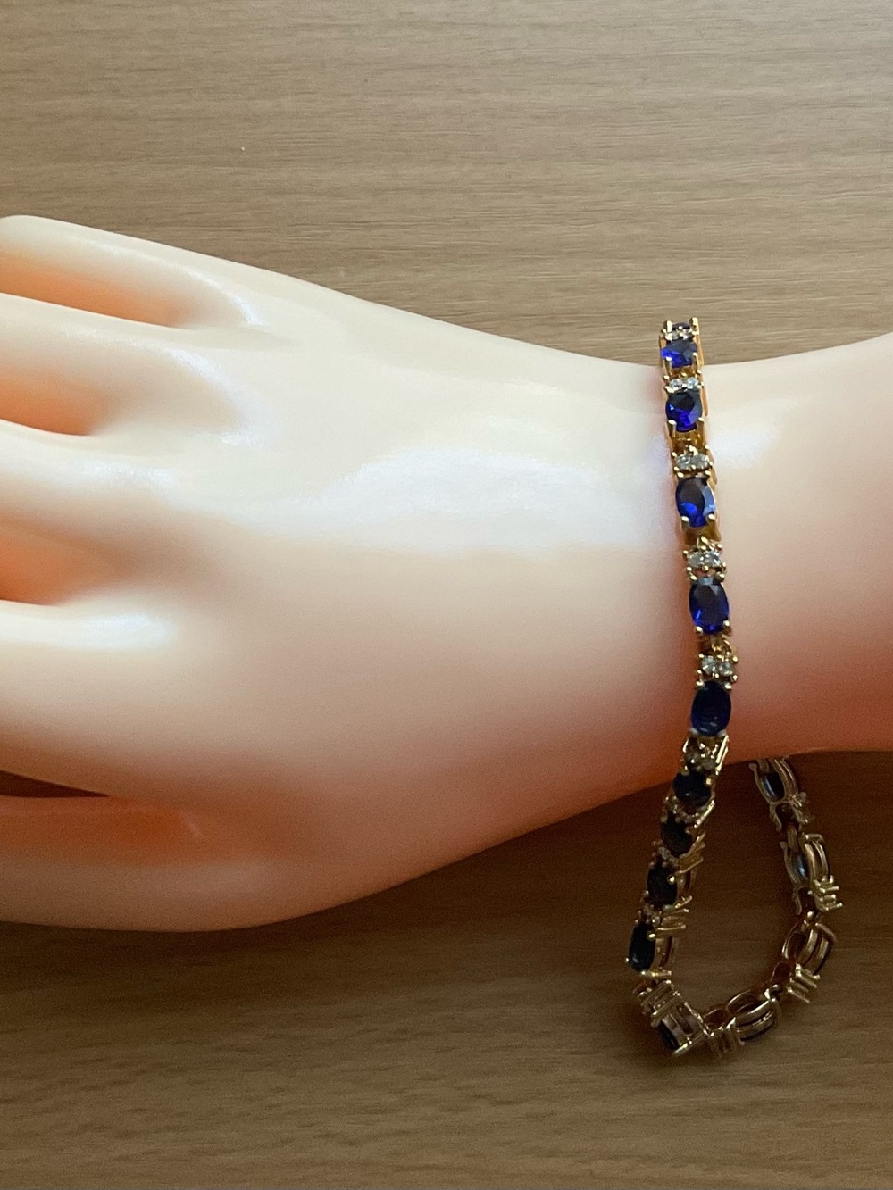 Vintage Avon Gold Tennis Bracelet with Deep Blue rhinestones